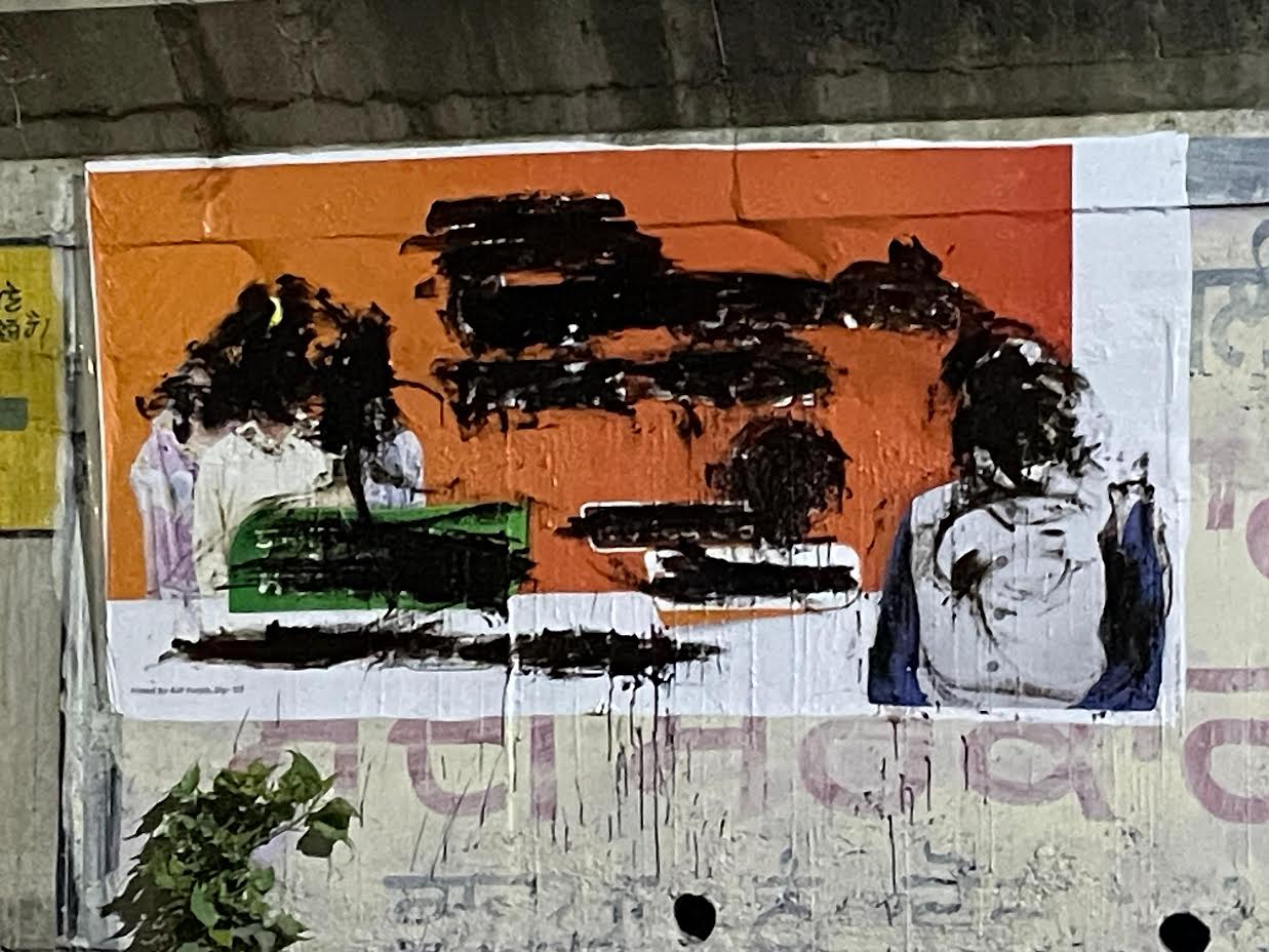 Black paint on BJP's Posters